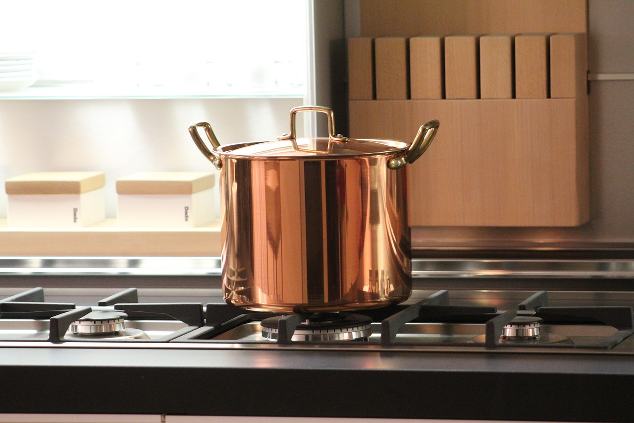 Traditional handcrafted Indian brass cooking vessel, specifically known as a Flat Bottom Lagan