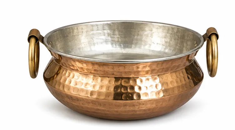 Pure Copper Handi features a hammered exterior finish with traditional ring brass handles and a protective interior tin lining