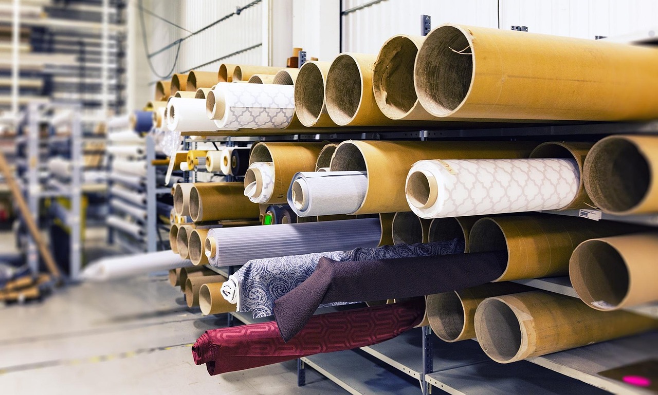 Woven fabric is any textile made by interlacing two sets of yarns at right angles—the vertical warp and horizontal weft—typically on a loom